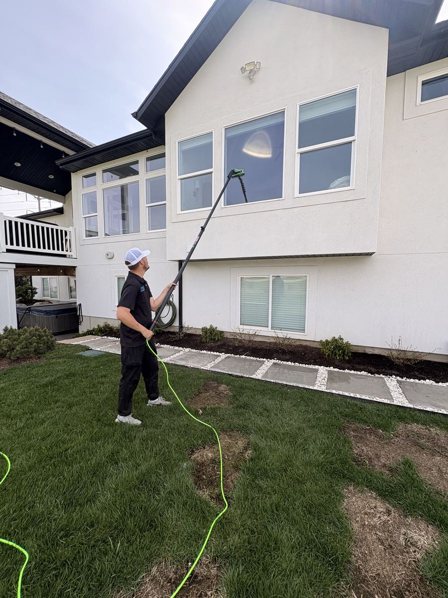 Window cleaning on a modern new-construction home in Layton, Utah
